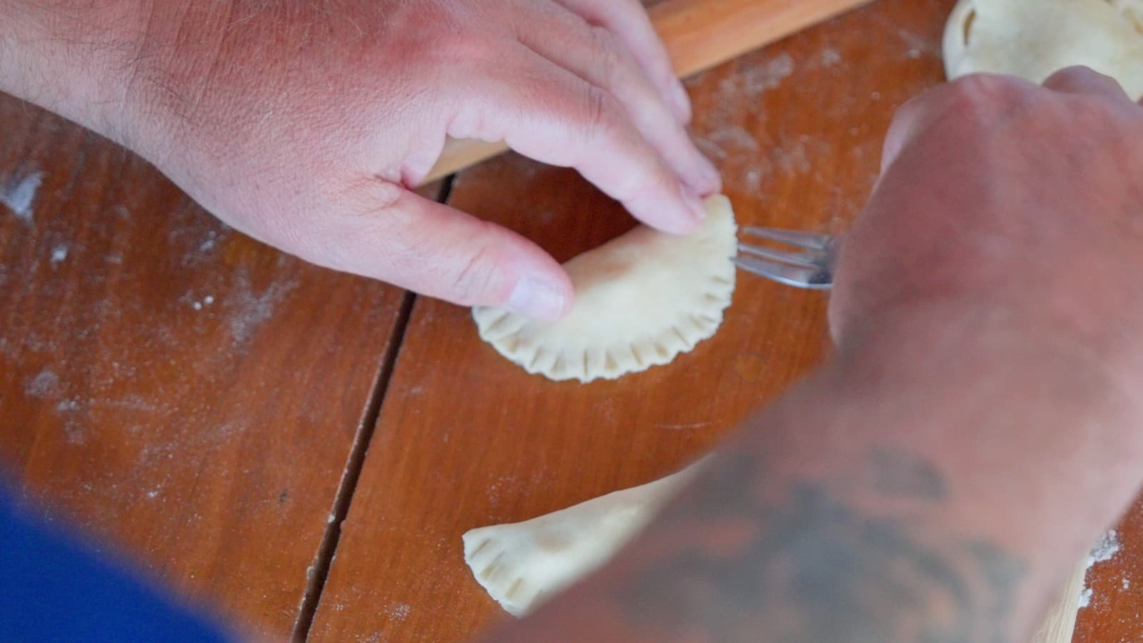 Kalitsounia being folded by hand